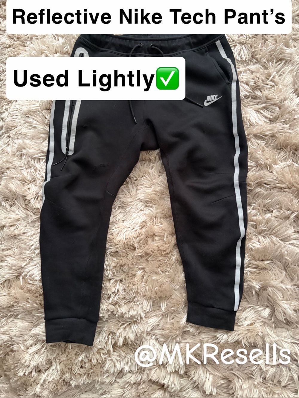 Nike Black Jogger Sweatpants with Reflective Side Stripes